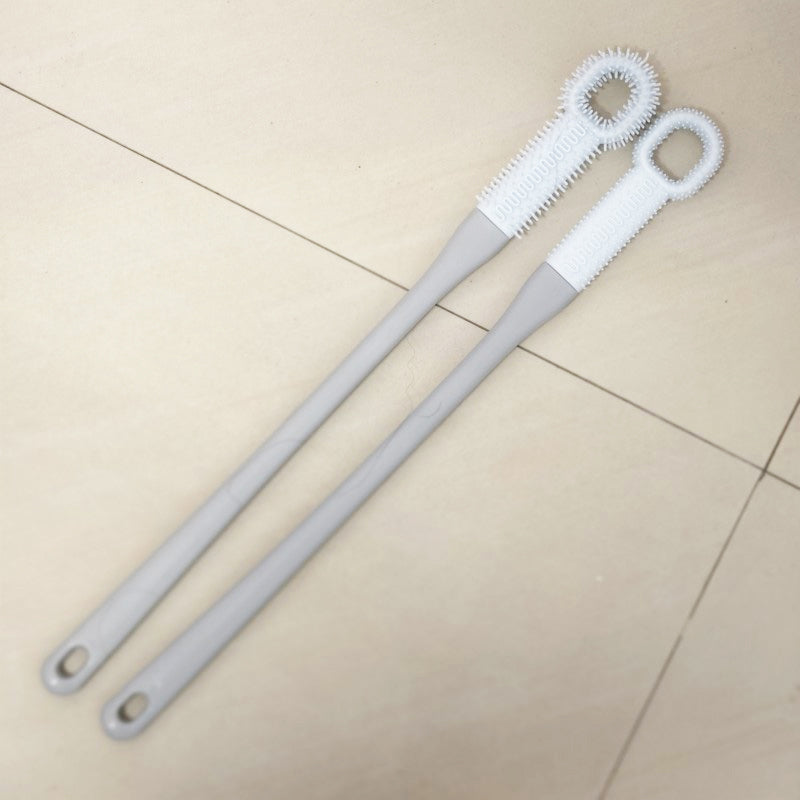 Szczotka do szorowania palców i stóp z długą rączką